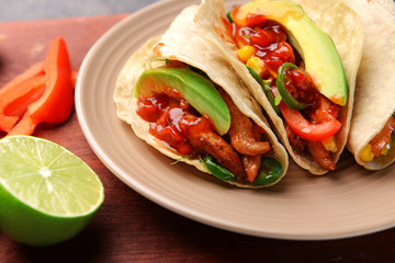 Tasty fresh tacos on plate, closeup