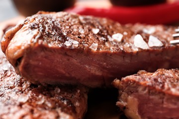 Slices of tasty grilled meat, closeup
