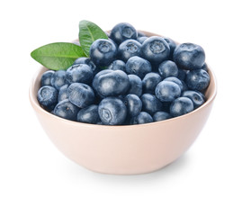 Bowl with ripe blueberry on white background