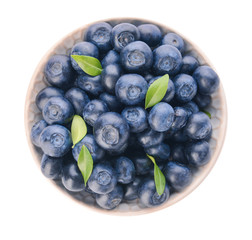 Plate with ripe blueberry on white background