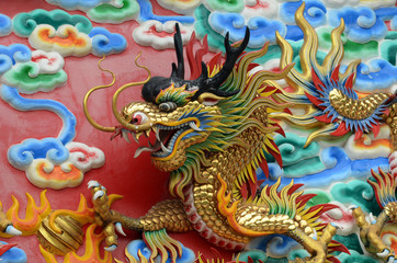 Obraz na płótnie Canvas Chinese dragon in the wall according to Buddhist temples