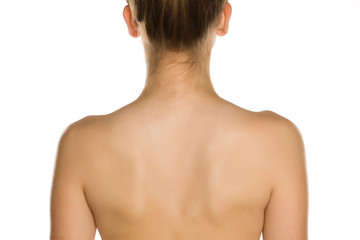 Nude back of young women on white background
