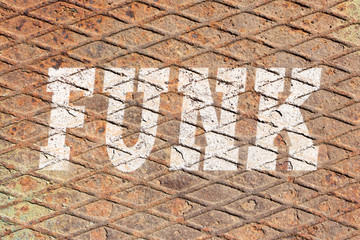 Word FUNK on rusty metal texture