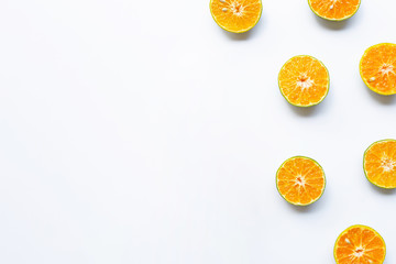 Half-cut oranges on white