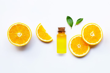Orange fruits with citrus oil. Natural vitamin C on white background.