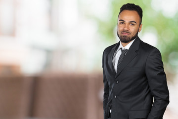 Handsome cheerful african american executive business man