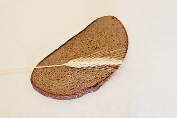 Bread and ear on a white background
