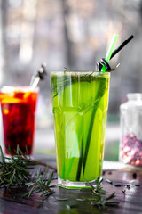 Green cocktail with lemon and mint