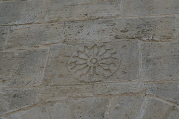 stone carving on wall