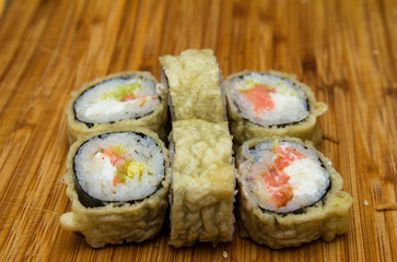 Sushi on a wooden tray. Japanese sushi.