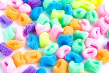 Bright multi-colored scrunchies on white
