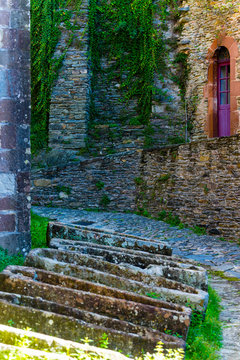 Europe,France,Midi-Pyrenees,Aveyron,Conques,Sainte-Foy, Saint James way, tombstone at the foot of the church