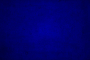 Blue dark edged grunge background overlaid with grungy elements.