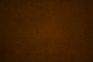 Brown dark edged grunge background overlaid with grungy elements.