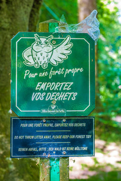 France, Brittany, Monts d'Arree, Huelgoat, signs from the National Forests Office to encourage people to not leave litter in the forest
