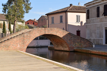 Fototapeta na wymiar The old houses on the canals of the town of Comacchio - Italy