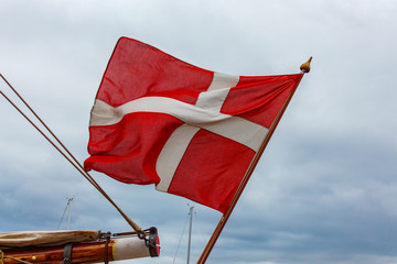 Danish flag on blue sky summer time