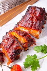BBQ spare ribs from a charcoal grill