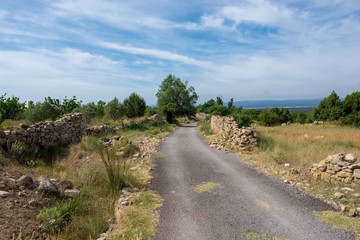 Rural road between mountains of the Sierra de Gudar, Valbona