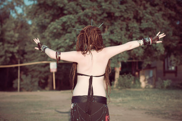 young woman dancing tribal