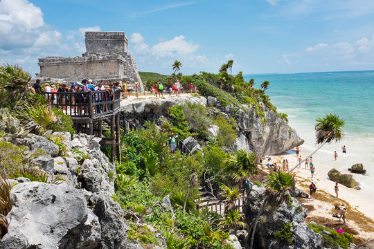 Crowd of tourist and El castillo of the archaeological site of Tulum, Quintana Roo, Mexico