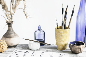 Artistic concept. Mockup with space for text. On the table are accessories for creativity from natural materials, clay and wood. Copy space