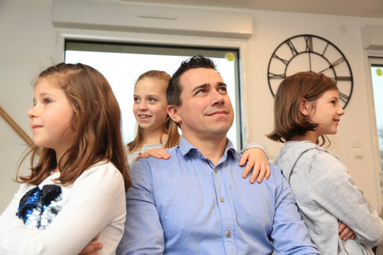 Single father and his children.