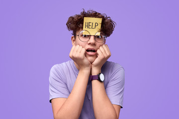 Anxious nerdy youngster asking for help