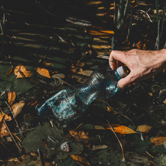 Volunteer picking up litter 