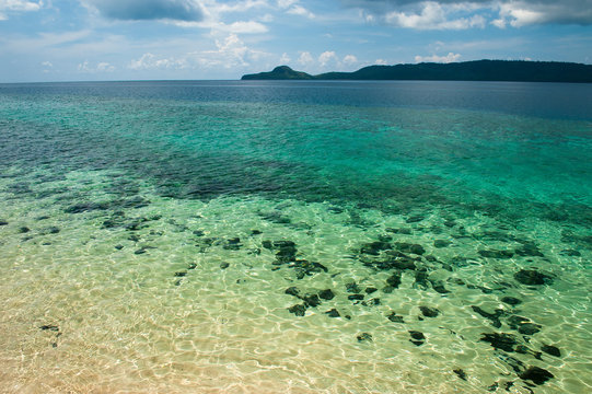 Sand and coral reef around Ilot Bambo, Mayotte, France