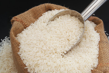 Rice sack with metallic scoop close up