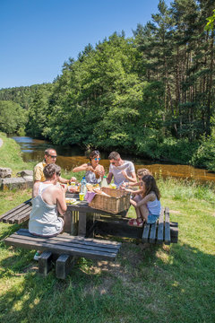 Auvergne - Rhone-Alpes - Haute-Loire - Saint-Julien-d'Ance - Family picnic on the bank of the Ance river.