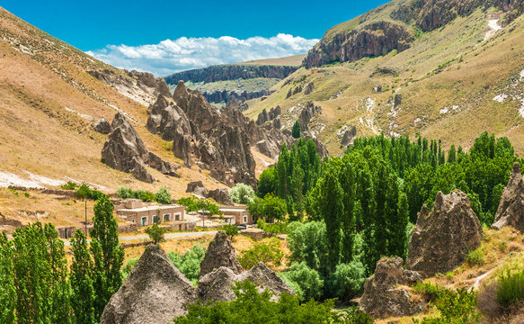 Turkey, Goreme National park and the rock sites of Cappadocia, landscape with houses of the Soganli valley close to Urgup (UNESCO World Heritage)