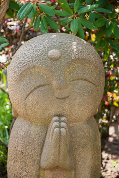 Na&icirc;ve style stone sculpture with joint hands, Hase dera,  Kamakura, Japan