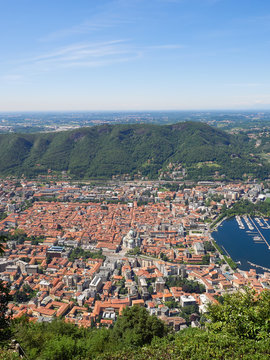 The small town of Como and the shores of Lake Como, Lombardy, Italy, as seen from the scenic point in Brunate