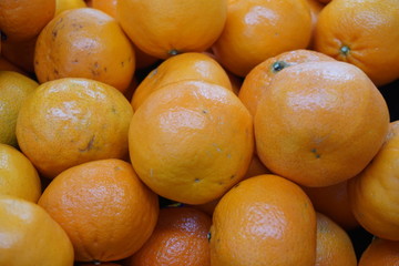 orange pile. Orange is a fresh tropical fruit