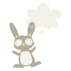 cute cartoon rabbit and thought bubble in retro style