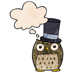 cartoon owl wearing top hat and thought bubble in grunge texture pattern style