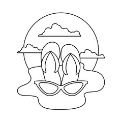 flip flops with sunglasses in the beach