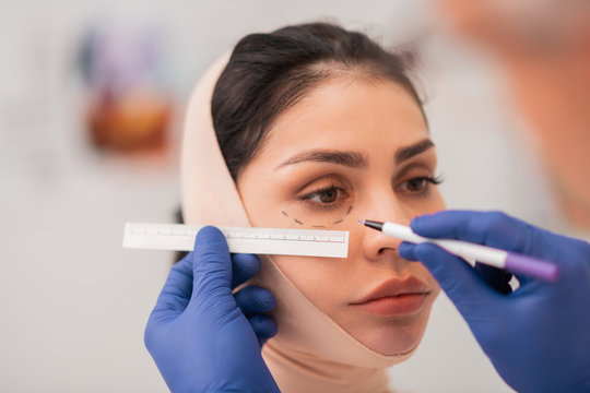 Dark-eyed Businesswoman Feeling Anxious Before Surgery Of Face