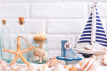 Fototapeta premium Living by the sea or ocean decorations near by white brick wall.