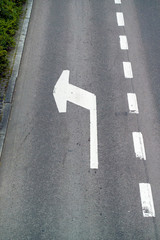 lane arrow on tarmac