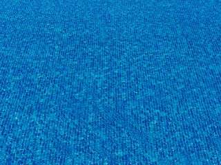 surface of blue swimming pool,background of water in swimming pool.