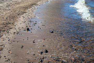 wave hitting empty shore, Finland