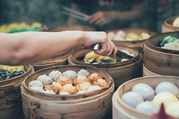 buying tasty local specialty in vendor.