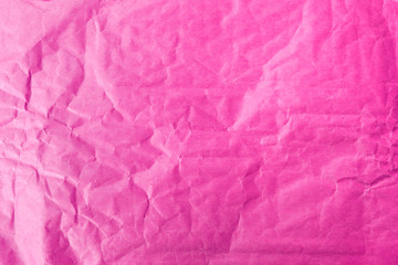 Abstract closeup wrinkle pink paper texture background