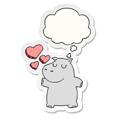 cartoon hippo in love and thought bubble as a printed sticker