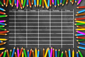 school timetable or class schedule template on blackboard framed by colored pencils