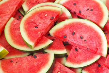 Many watermelon slices close up