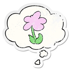 cute cartoon flower and thought bubble as a distressed worn sticker
